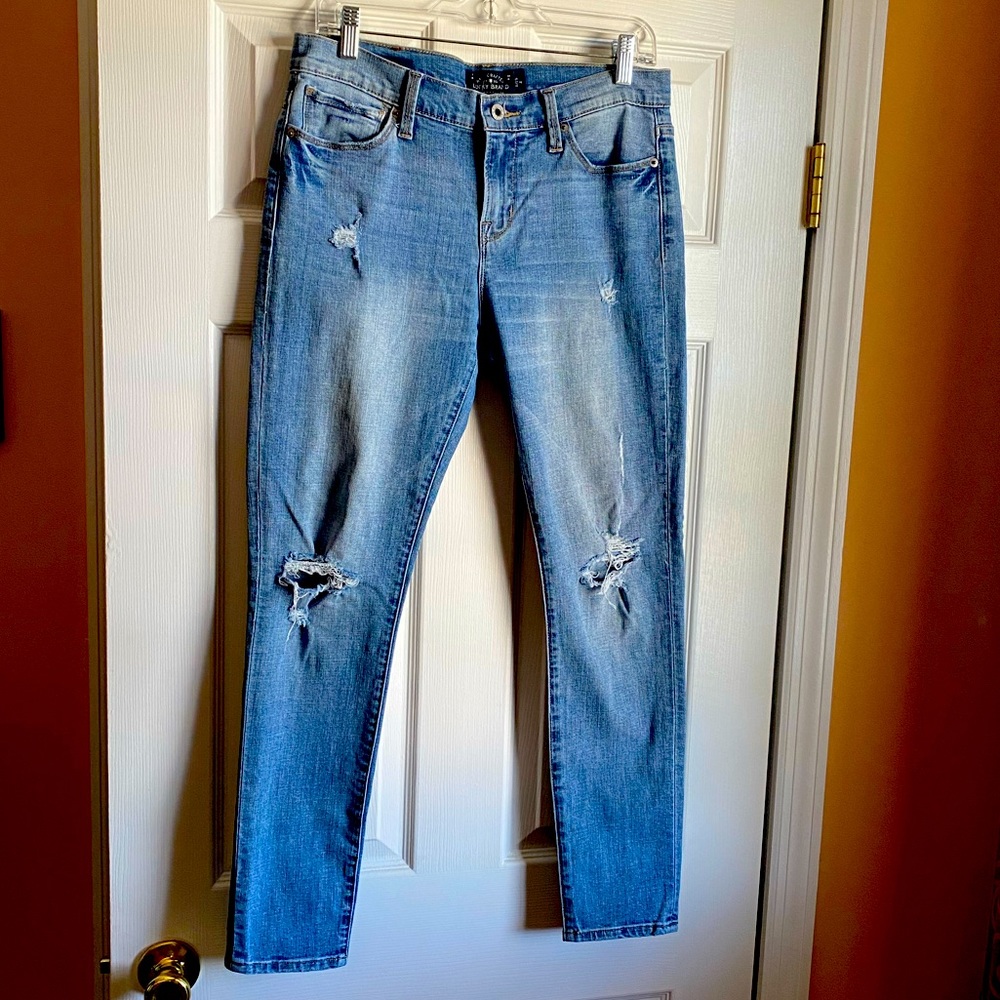 Womens lightly distressed jeans